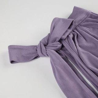 Sleeveless high neck knotted ruched top