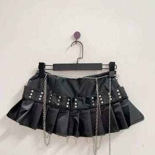 Cross applique pleated zip-up o ring mini skirt