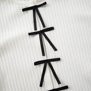 Long sleeve slit hollow out bowknot textured cut out top