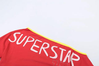 Short sleeve one shoulder â€œsuper starâ€ print top