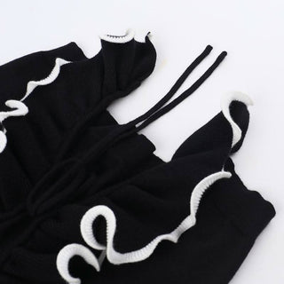 Long flared sleeve ruffle v neck self tie ruched top