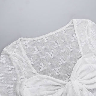 Long sleeve knotted flower pattern top