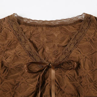 Long flared sleeve textured lace hem ruffle top