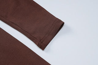 Ribbed notch neck long sleeve solid romper