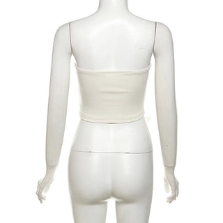 Flower applique backless solid tube top