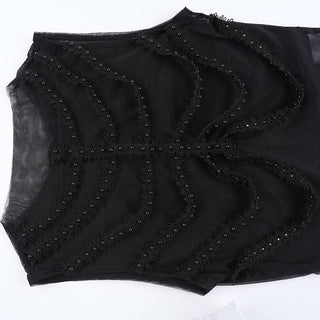 Sleeveless crewneck mesh beaded top