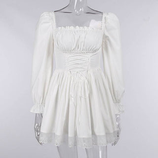 Long sleeve smocked lace up lace hem mini dress