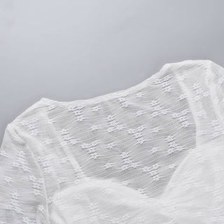 Long sleeve knotted flower pattern top