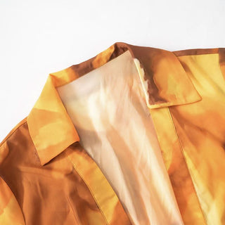 Button long sleeve ruched turnover collar print top