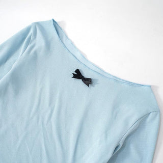 Long flared sleeve round neck bowknot textured top