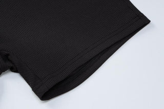 Solid ribbed cross back long sleeve shrug romper