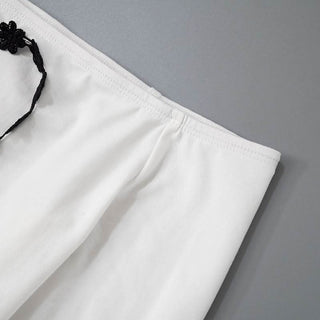 Hollow out long sleeve off shoulder self tie cut out top