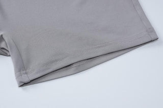 Short sleeve crewneck solid backless hollow out romper