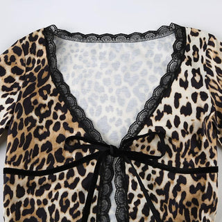 Long sleeve lace hem leopard print ruffle self tie top