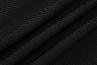 Solid ribbed cross back long sleeve shrug romper