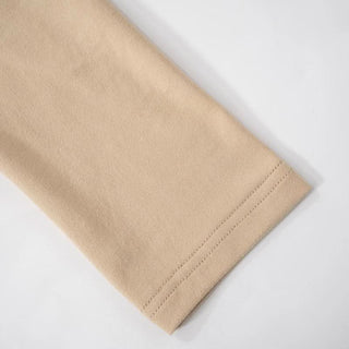 Long sleeve off shoulder ruched self tie stitch top