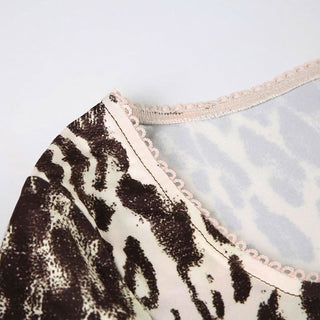 Leopard print long sleeve u neck lace hem top