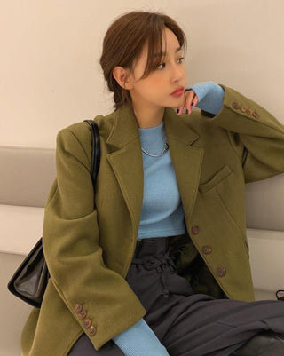 Lapeled single-breasted loose woolen jacket
