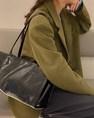 Lapeled single-breasted loose woolen jacket