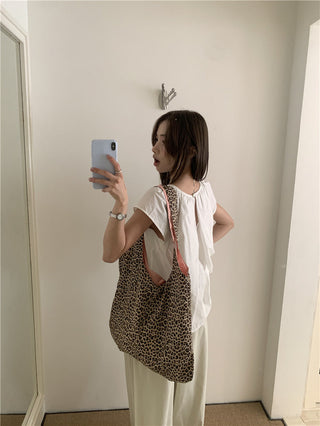 Hollow design solid color shirt