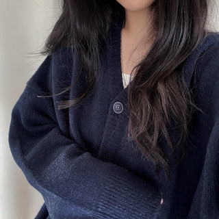 Oversized long -sleeved knitted cardigan