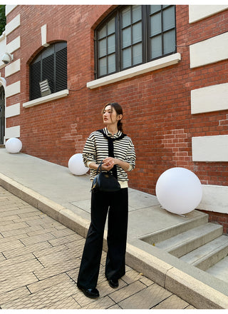 Pleated bootcut pants
