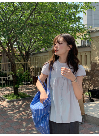 Stand collar pleated blouse