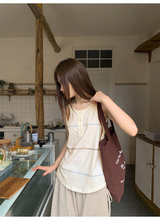 gray embroidered vest