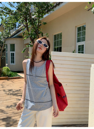 gray embroidered vest