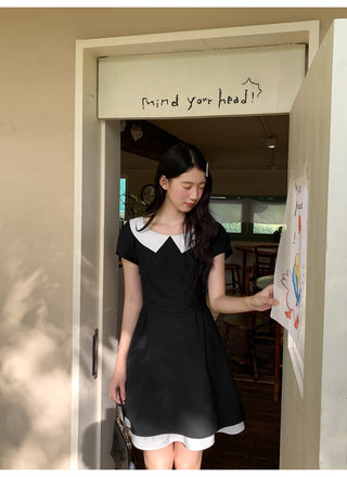black scoop dress