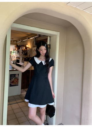black scoop dress