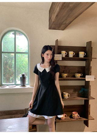 black scoop dress