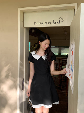 black scoop dress