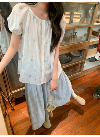 embroidered round neck