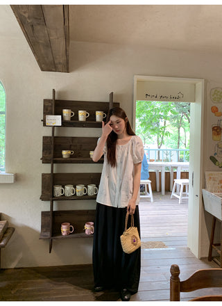 embroidered round neck