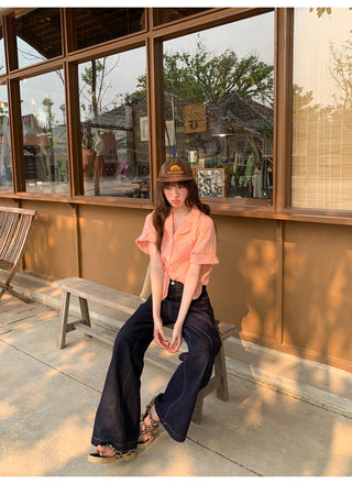 dark embroidered jeans
