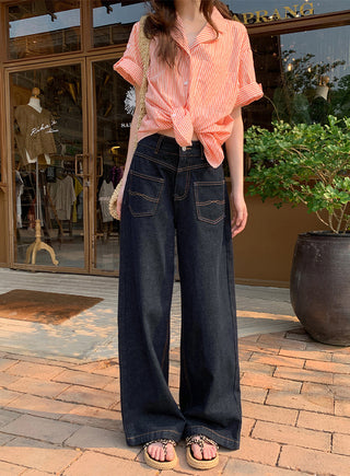 dark embroidered jeans