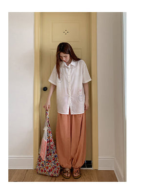 white embroidered shirt