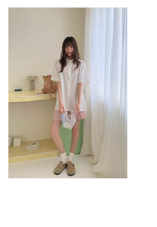 white embroidered shirt