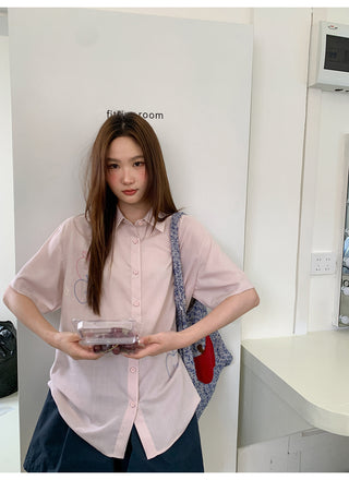 white embroidered shirt