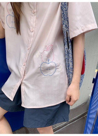 white embroidered shirt