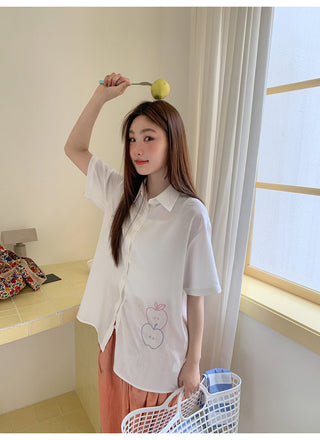 white embroidered shirt