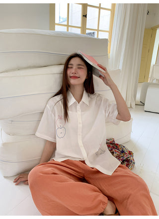 white embroidered shirt