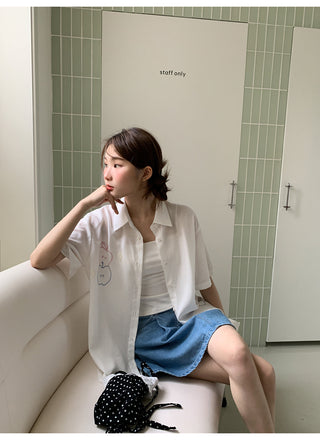 white embroidered shirt