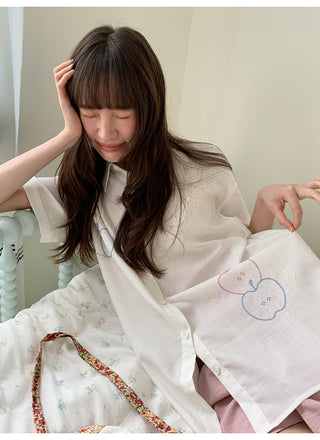 white embroidered shirt