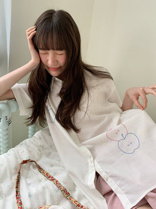 white embroidered shirt