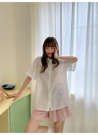 white embroidered shirt