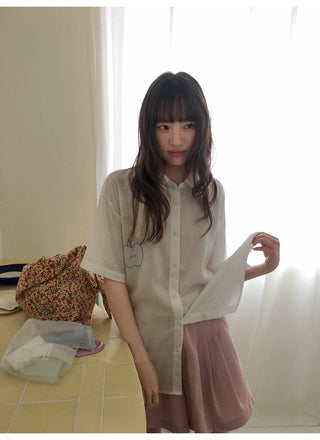 white embroidered shirt