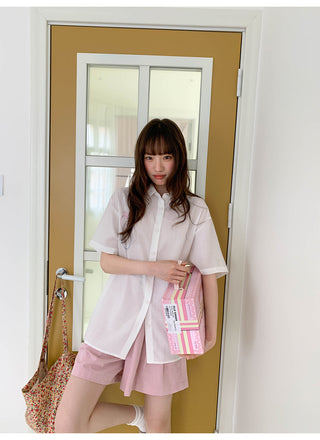 white embroidered shirt