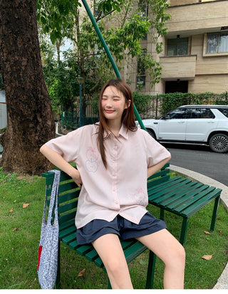 white embroidered shirt